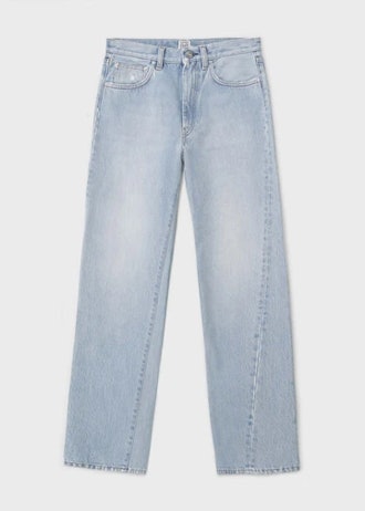 Totême twisted denim in light blue. 