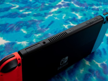 Nintendo Switch OLED fans and cartridge