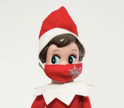 Elf on the Shelf wearing a snowflake mask