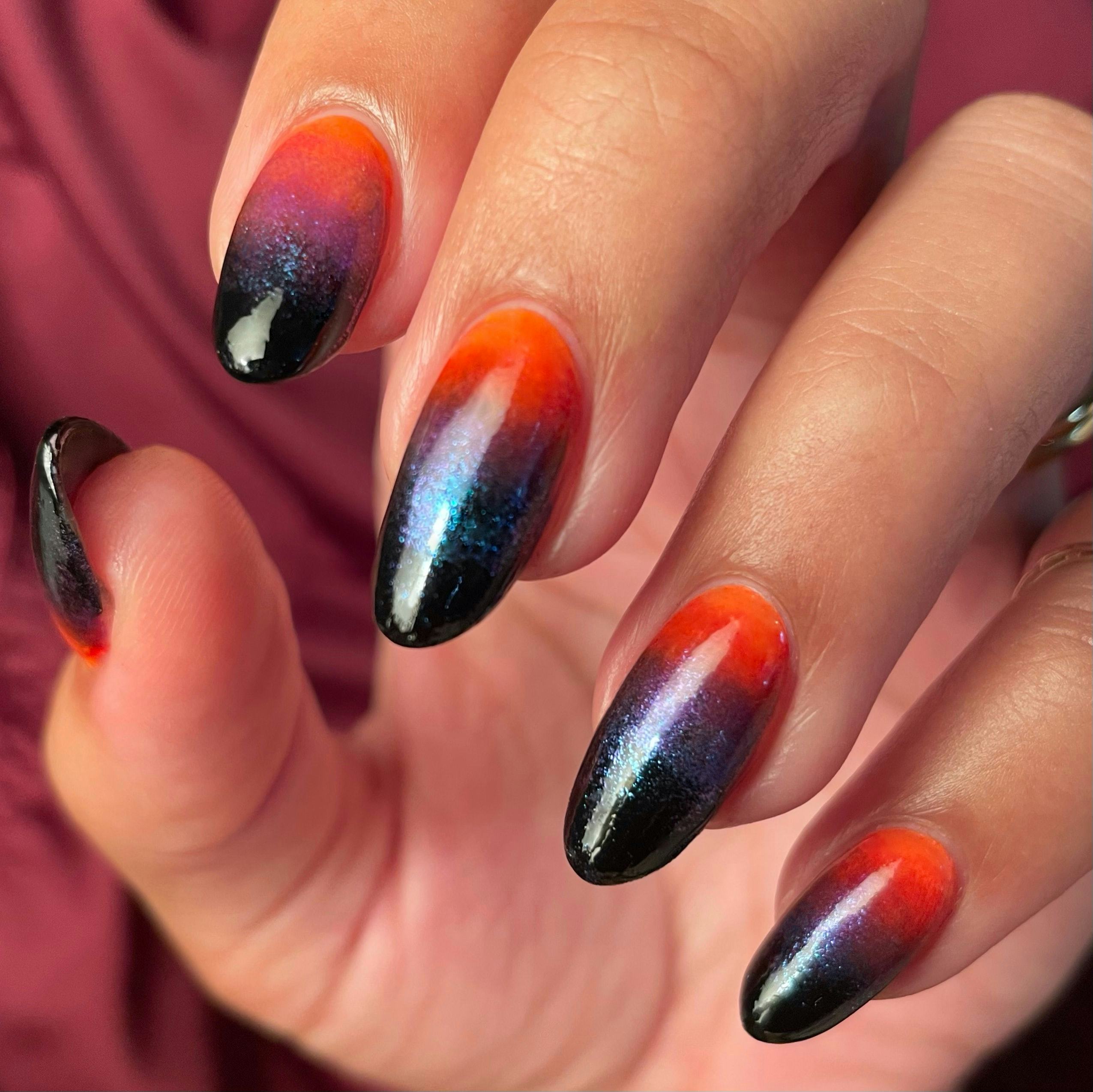 From candy corn to ghosts to spider webs, these spooky manicures are here if you need design ideas f...