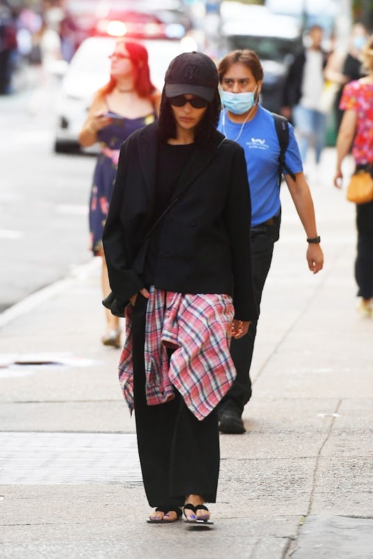 Zoe Kravitz keeps a low profile during a stroll in SoHo.