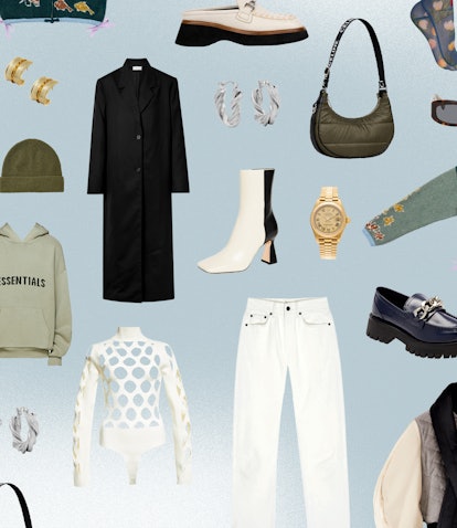 Winter essentials, boots, watches, handbags, pants, shoes, and jackets on a light blue background