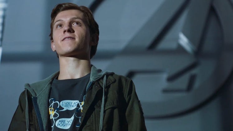 Tom Holland’s Peter Parker standing in the shadow of the Avengers in Spider-Man: Homecoming