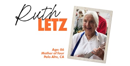 An older woman ruth letz smiling while playing a ukulele