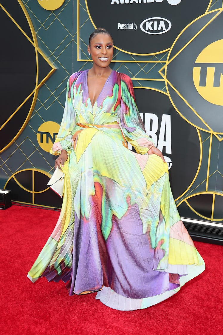 Issa Rae in a multicolored gown on the NBA Awards red carpet 