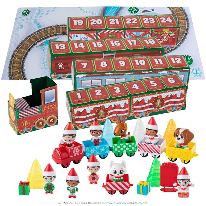 elf on the shelf advent train with mini train cars and elf figurines