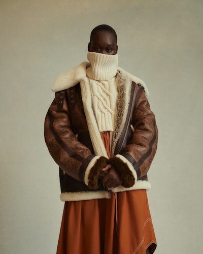 Model wearing shearling coat