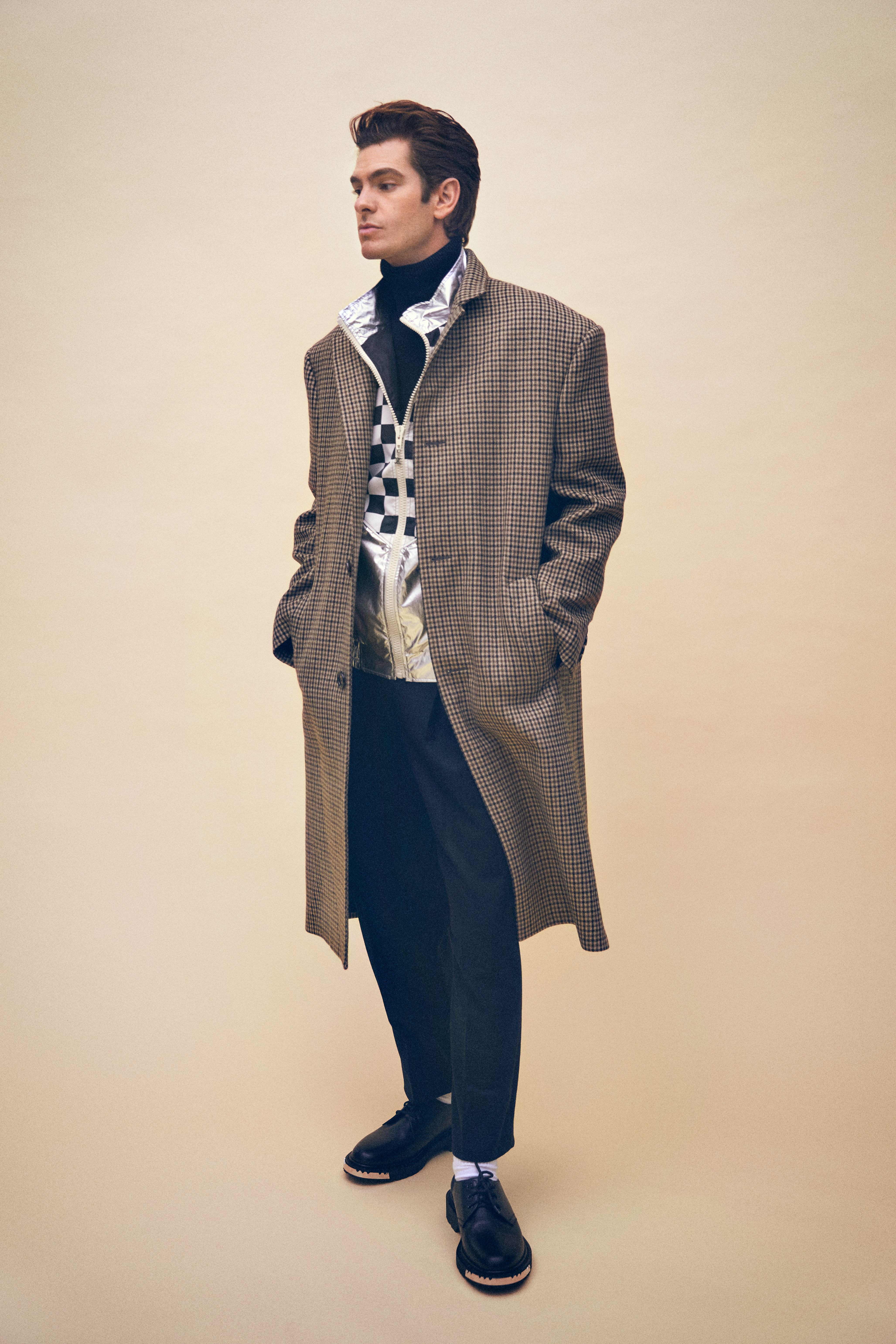 Garfield posing in a brown coat and black shoes from Celine by Hedi Slimane and The Tie Bar socks in&hellip;