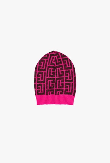 Neon pink and black Balmain-monogrammed wool beanie from Balmain x Rossignol ski capsule.