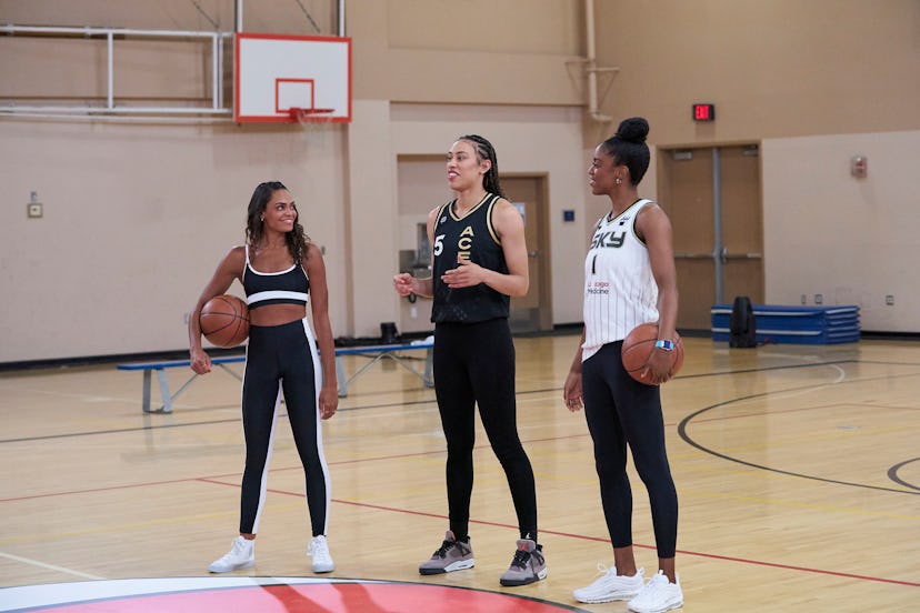 Michelle Young leading a group date with WNBA players, Dearica Hamby and Diamond Deshields.