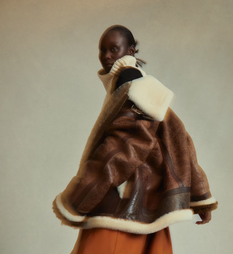 Model wearing shearling coat