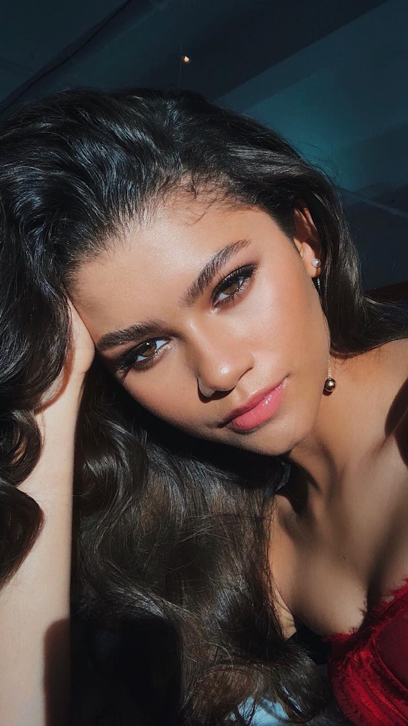 Zendaya with dark old hollywood curls close-up selfie
