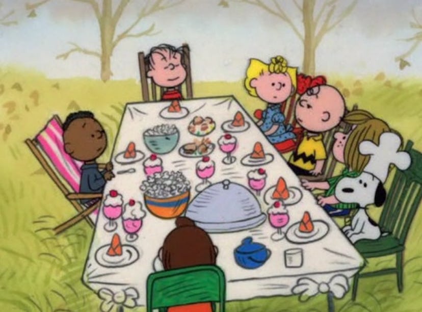 The Peanuts gang gather around the table in the Thanksgiving kids' movie 'A Charlie Brown Thanksgivi...