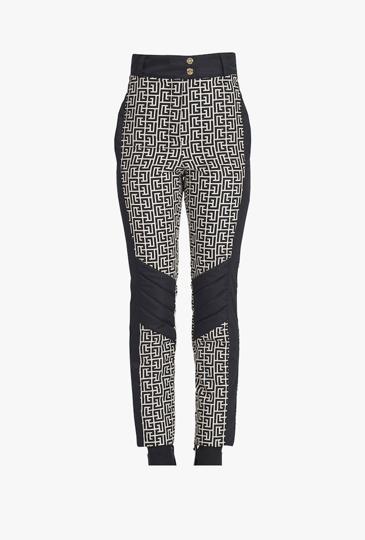 Ivory and black Balmain-monogrammed high-waisted ski pants from Balmain x Rossignol ski capsule.