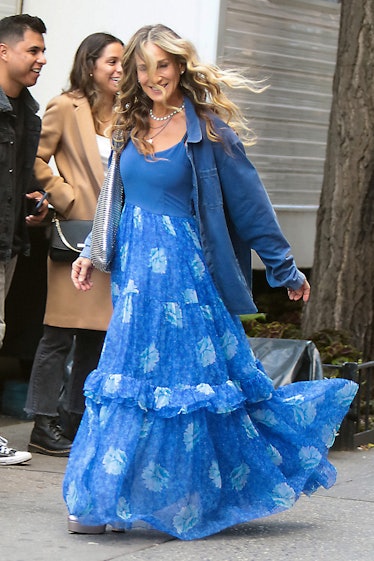 Carrie wearing blue flowy dress
