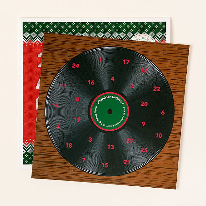 an advent calendar that looks like a vinyl record with QR code to download Christmas carols