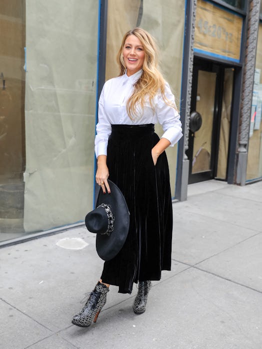 Blake Lively wearing heeled lace-up booties.