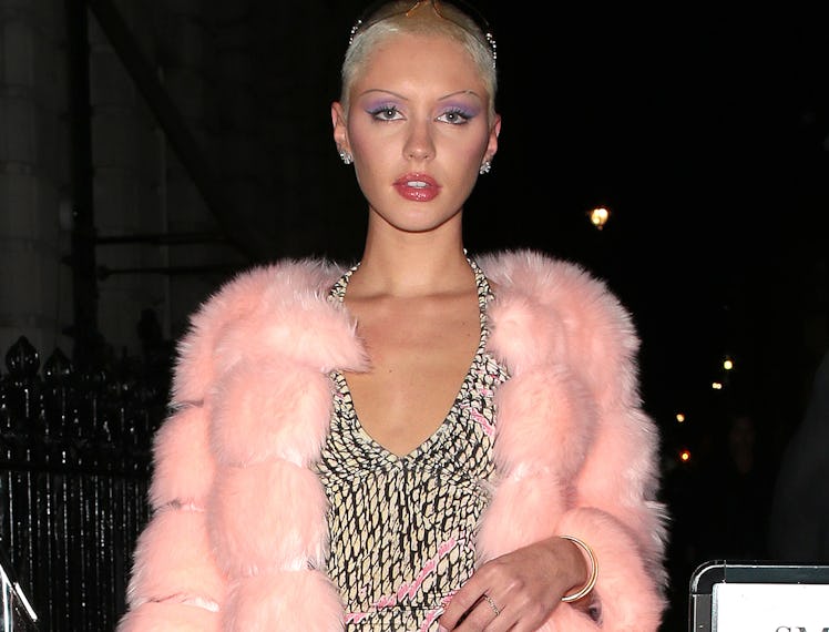 Iris Law in pink fur coat.