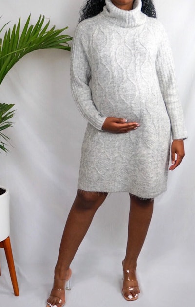 Pregnant woman modeling grey maternity sweater dress
