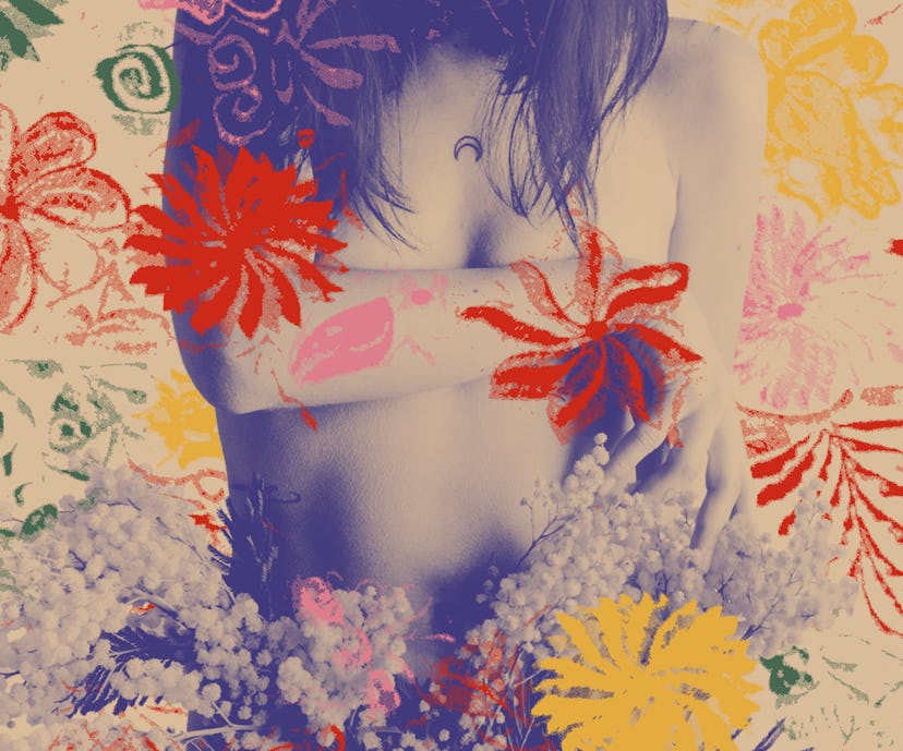 A woman covers her breasts while illustrations of flowers surround her