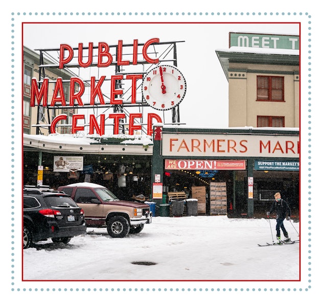  Late in the day the sun reflecting at the iconic public market sign at Pike Place Market.