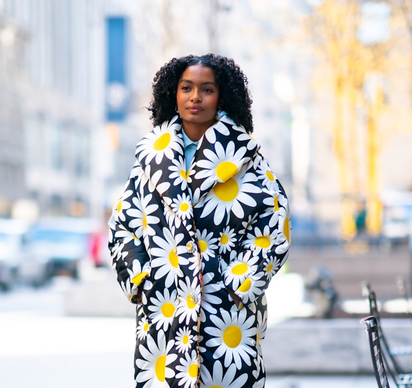 Yara Shahidi wearing Moncler coat.