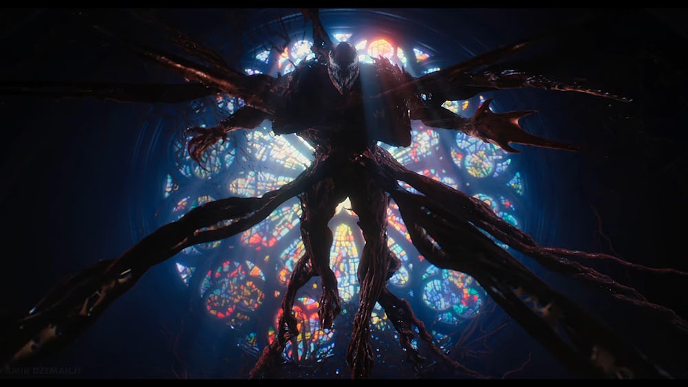 Carnage stretches out all of his limbs in front of a cathedral window