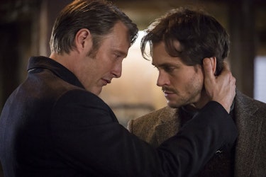 Hannibal has his hand on Will's neck