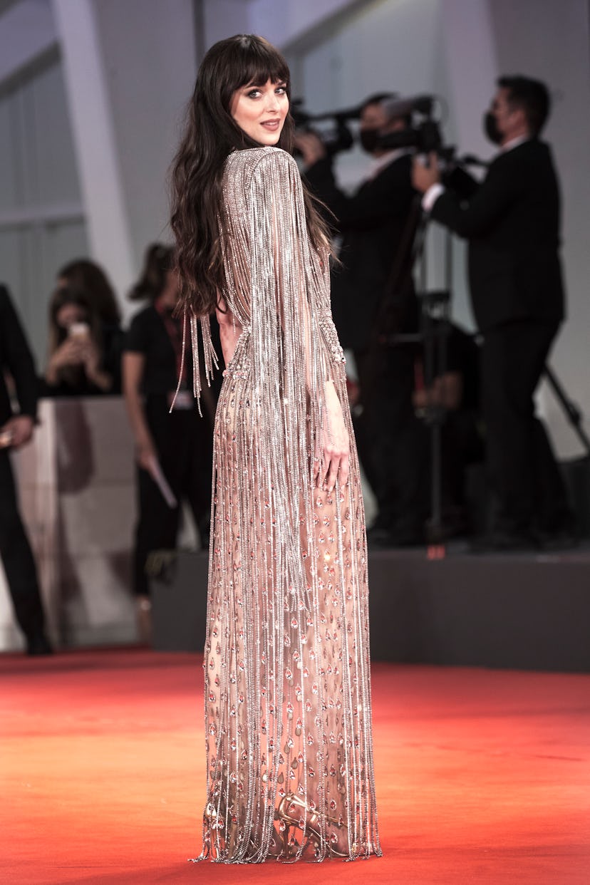 Dakota Johnson attends the red carpet of the movie "The Lost Daughter" during the 78th Venice Intern...