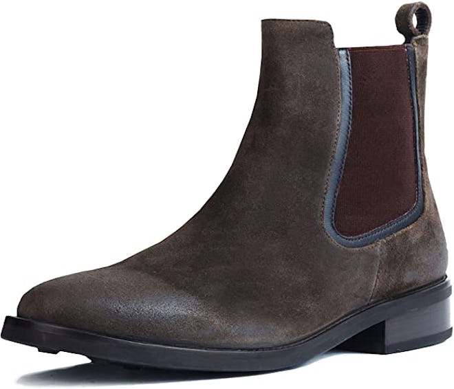 These rustic Chelsea boots are made of distressed brown leather.