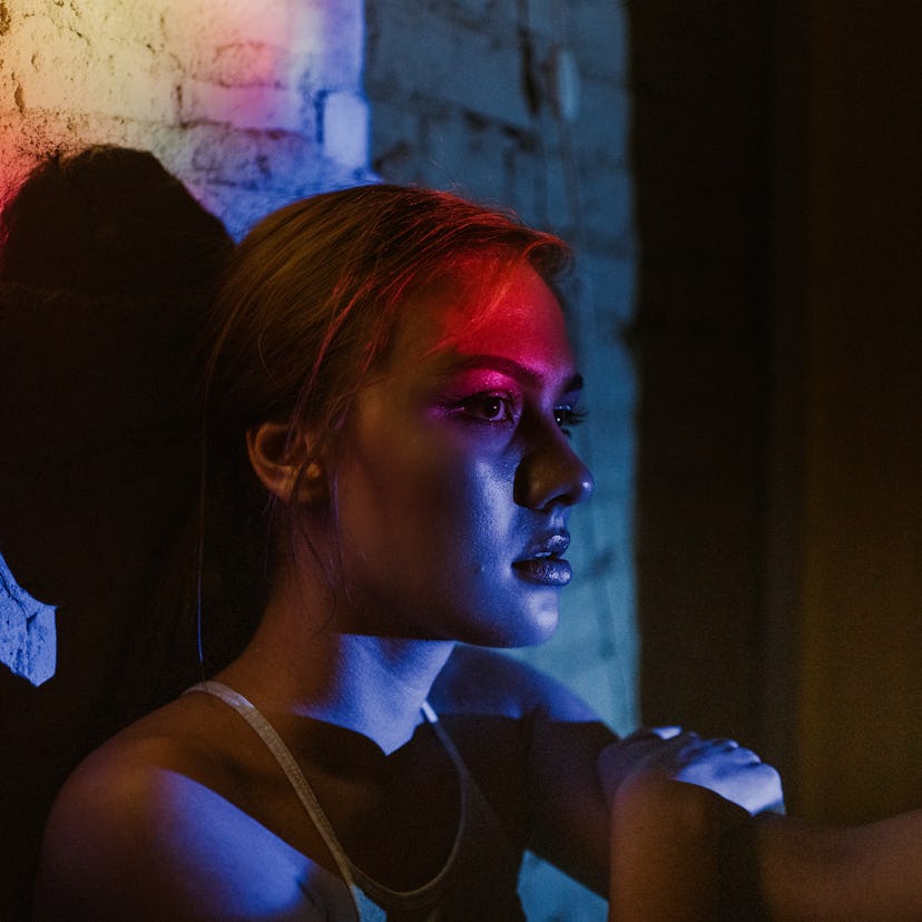 Young woman under the last full moon before Halloween on Oct. 20, 2021, which will affect her zodiac...