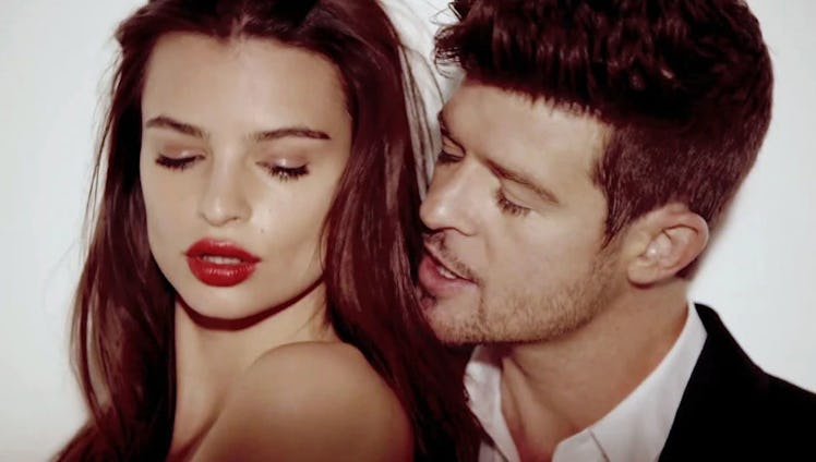 Emily Ratajkowski and Robin Thicke in the "Blurred Lines" music video.
