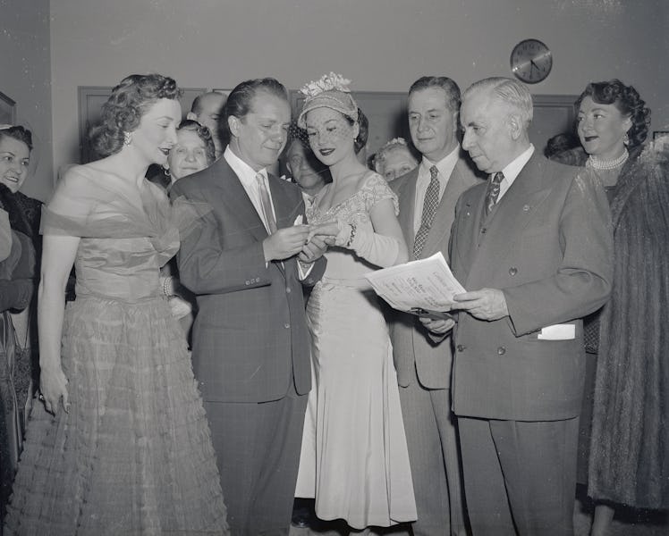 Cindy Adams and her husband, comedian Joey Adams, and others.