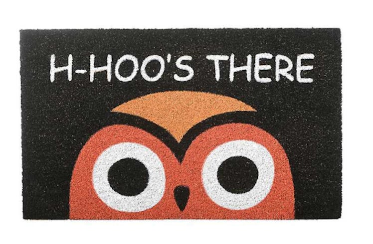 These Halloween doormats include a cute orange owl design.