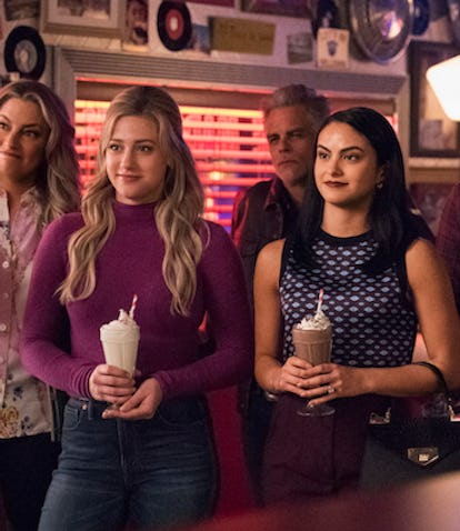 Betty (Lili Reinhart) and Veronica (Camila Mendes) hang out at Pop's in Season 5 of 'Riverdale.'