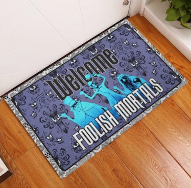These Halloween doormats include Haunted Mansion options.