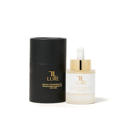 a tincture of CBD oil from Lure next to its packaging
