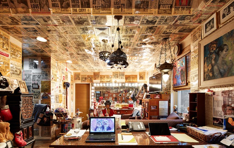 Adams's office walls and ceiling are covered with her front pages from the Post.