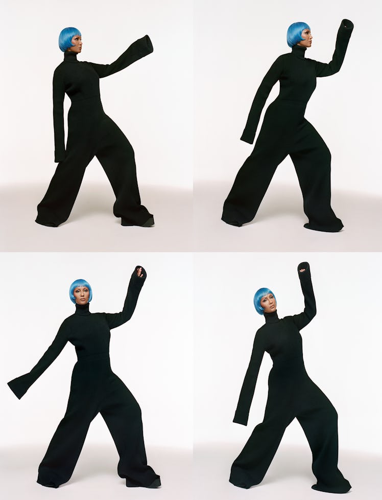Iman wears a Marc Jacobs jumpsuit and shoes.