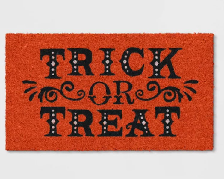 These Halloween doormats include a classic Trick-Or-Treat design.