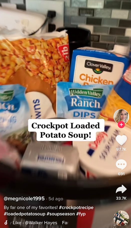 A woman shows off how to make TikTok's viral crockpot potato soup with all the ingredients in the cr...