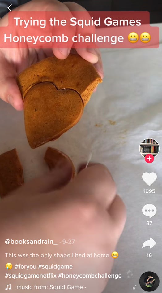 A TikTok user plays the 'Squid Game' honeycomb challenge with dalgona candy.