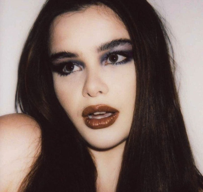 Barbie Ferreira with long dark hair and smokey eye