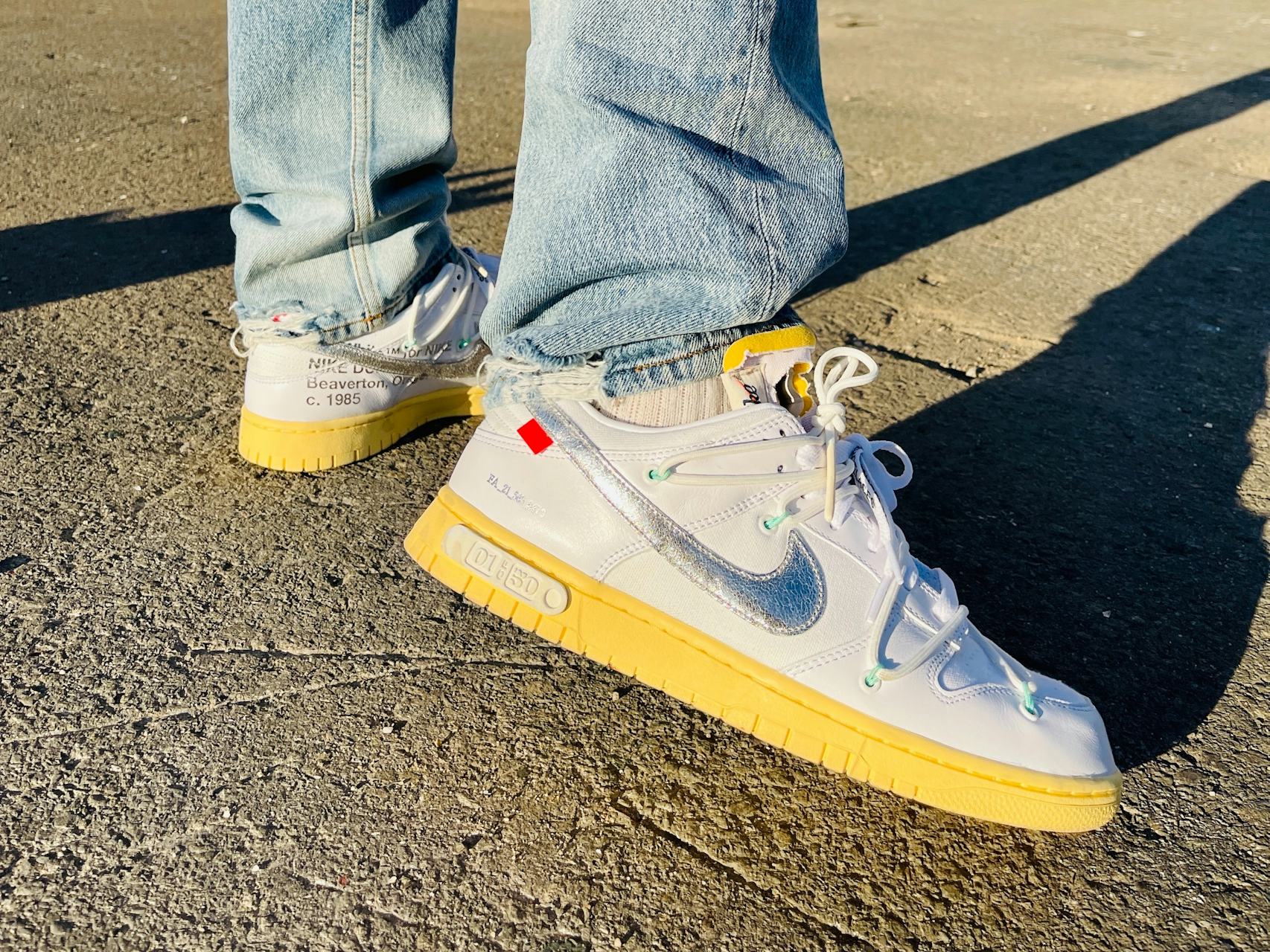 Nike off white dunk low on feet Clearance