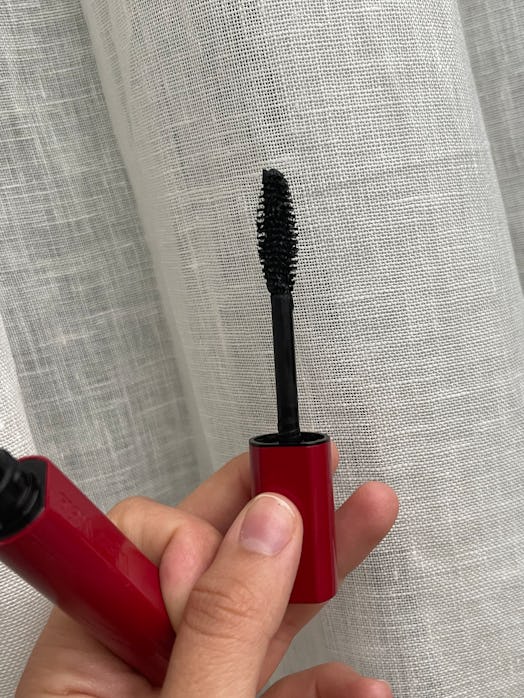 The curved side of the Kjaer Weis Im-Possible Mascara.