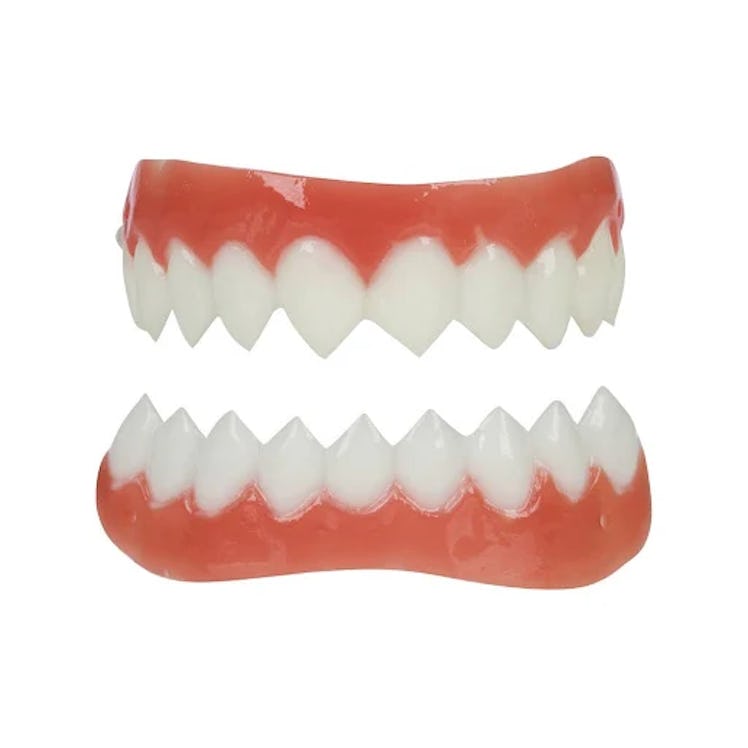 Fake sharp teeth are a big part of any 'AHS: Double Feature' costume.