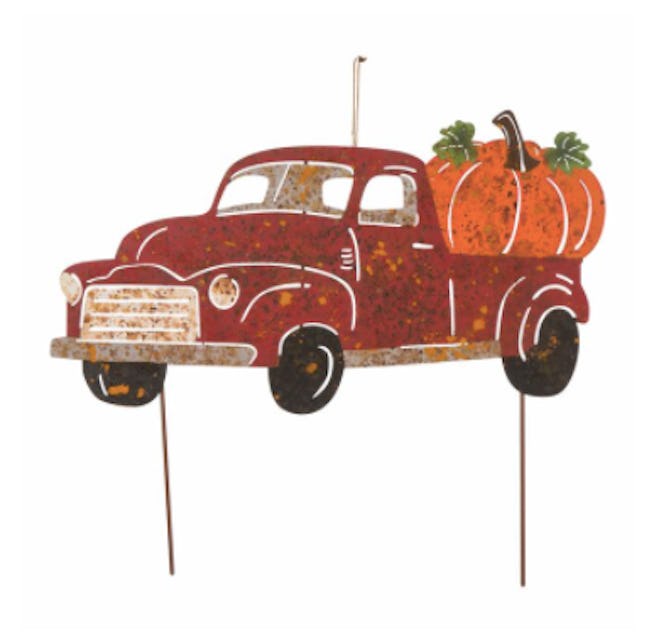 Metal red truck with pumpkin outdoor stake yard art