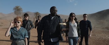 The Eternals standing together in the desert