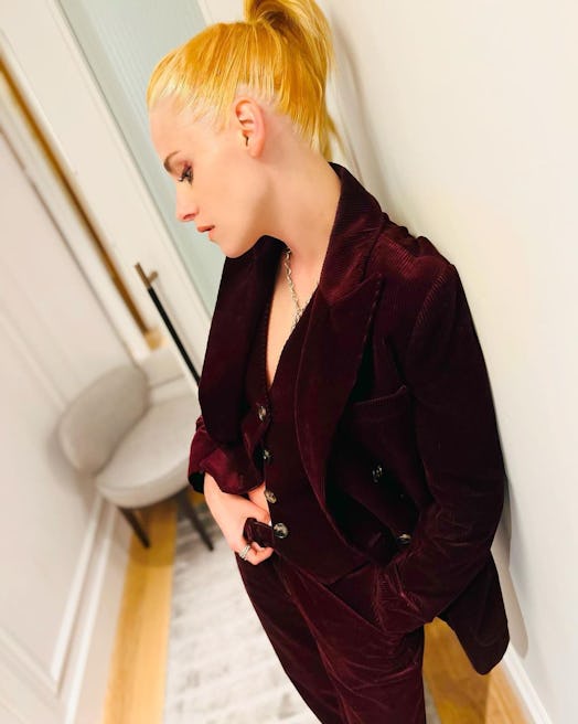 Kristen Stewart in burgundy waistcoat and pantsuit set from Bella Freud.