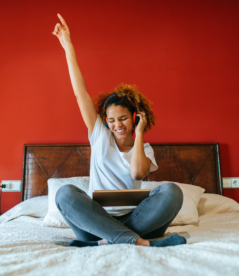 Excited young woman having the best day on November 15, 2021, per her zodiac sign.